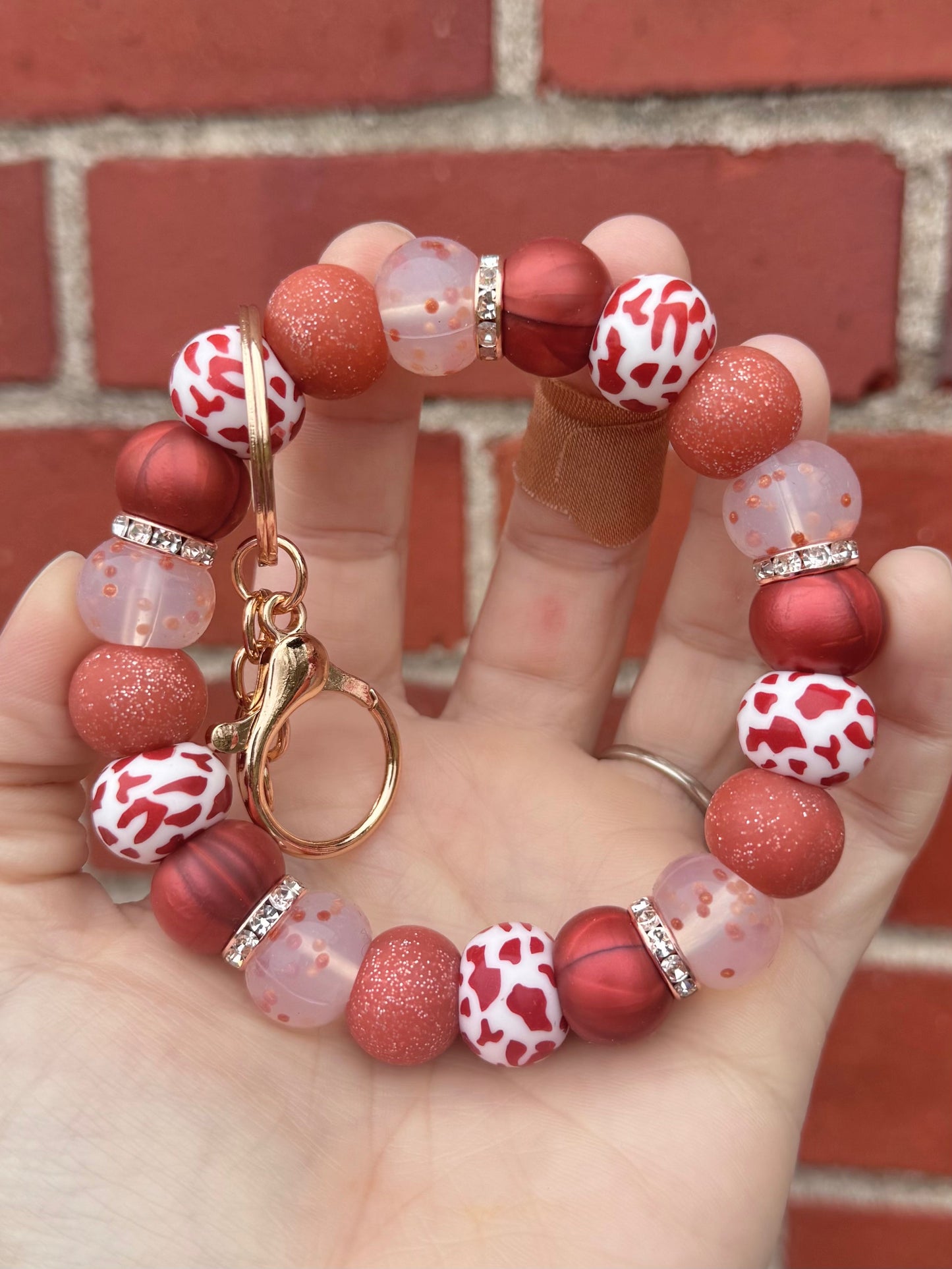 Crimson Rust Cow Wristlet - Original Size